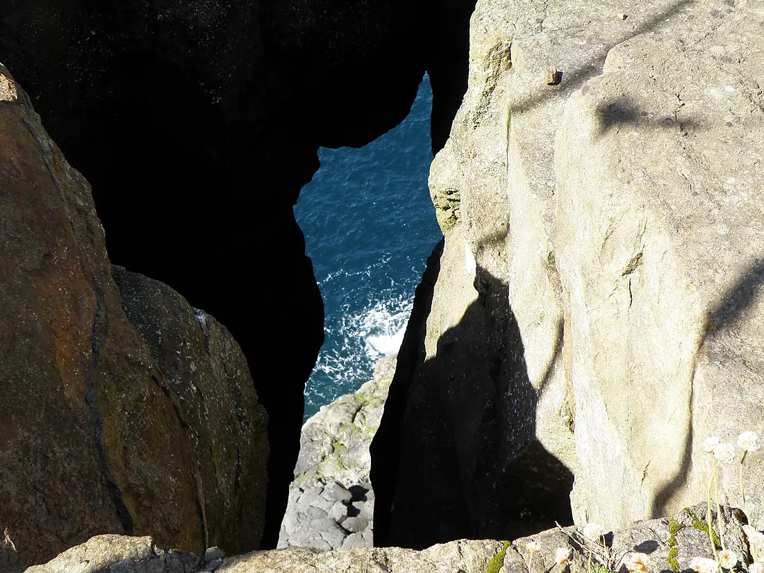 A Natural Hole in the Cliff of Nordbergseidi in Hvalba Faroe Islands
