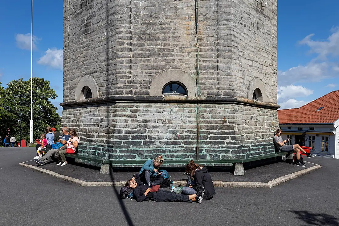 People enjoying the sun next to the Valbergtårnet, Stavanger, Norway julesvernex2